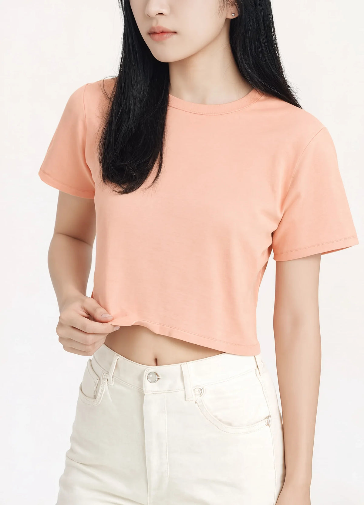 nabi Signature Crop Tee in Peach Faded (faded peach), hem and fabric close-up