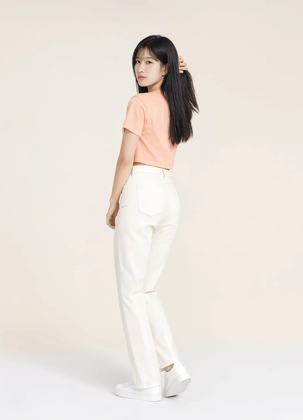 nabi Signature Crop Tee in Peach Faded (faded peach), three-quarter back view
