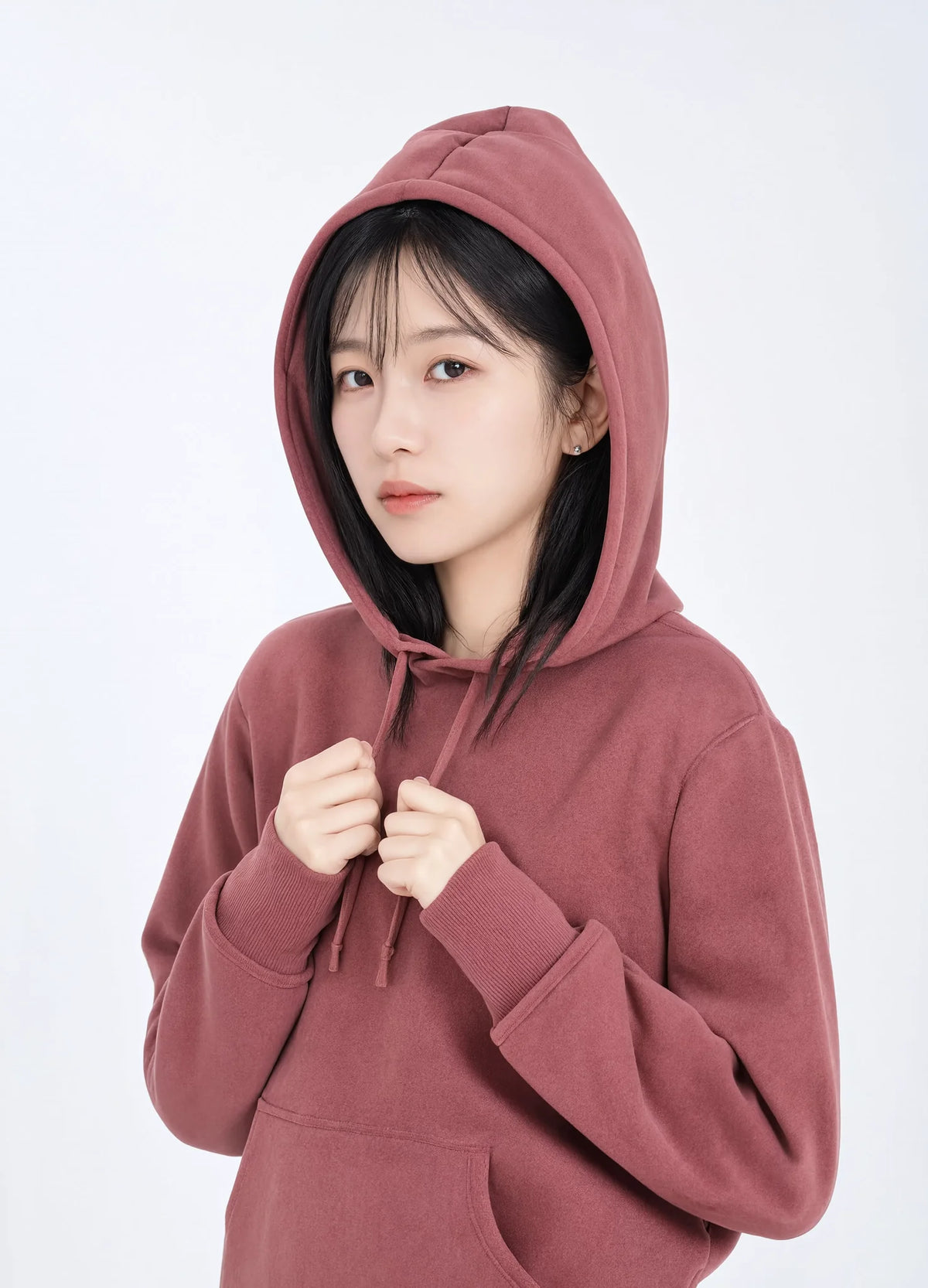 nabi Pigment-Dyed Hoodie in Ember Rose (dusty rose), hood up, portrait