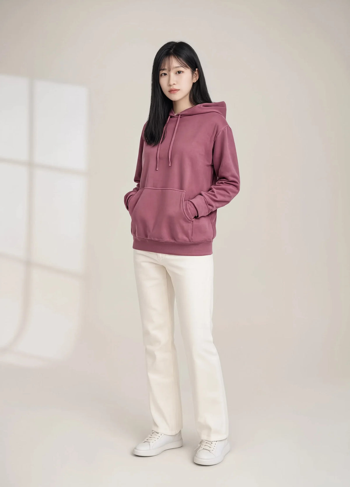 nabi Pigment-Dyed Hoodie in Ember Rose (dusty rose), front view, hands in pocket