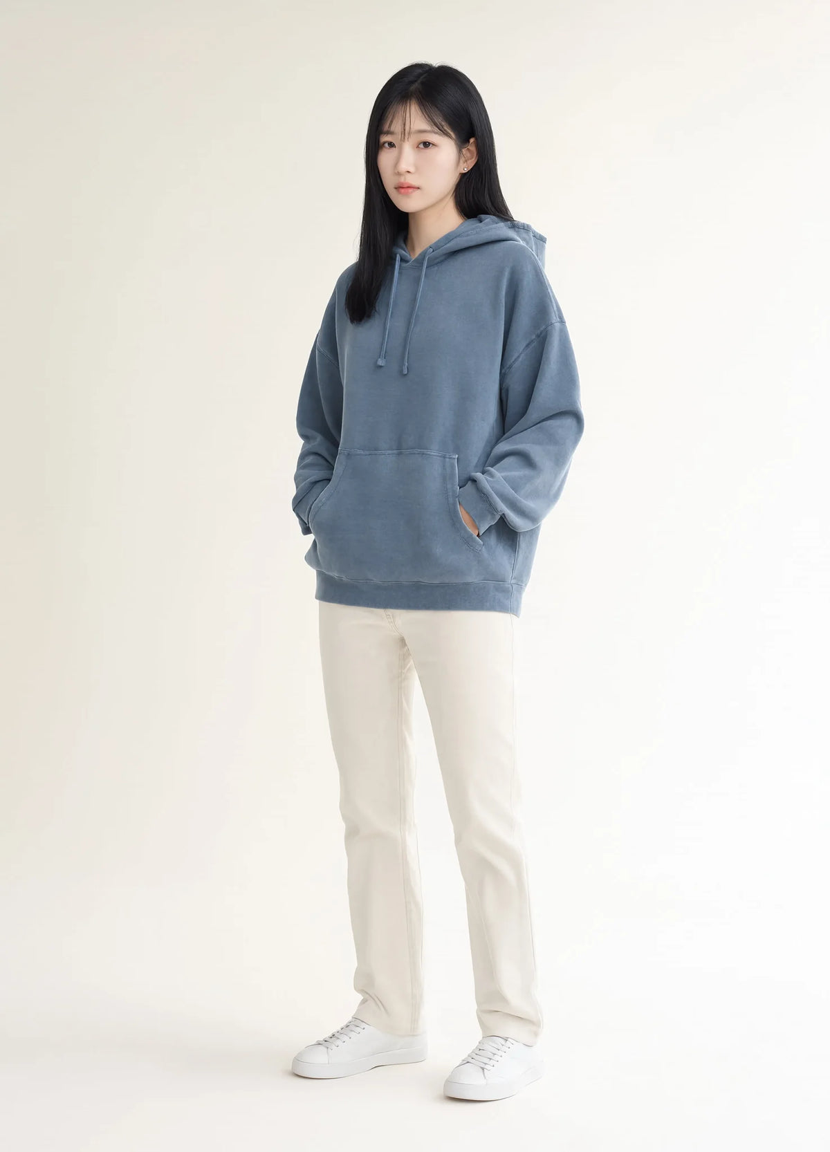 nabi Pigment-Dyed Hoodie in Washed Chambray (washed blue), front view on model