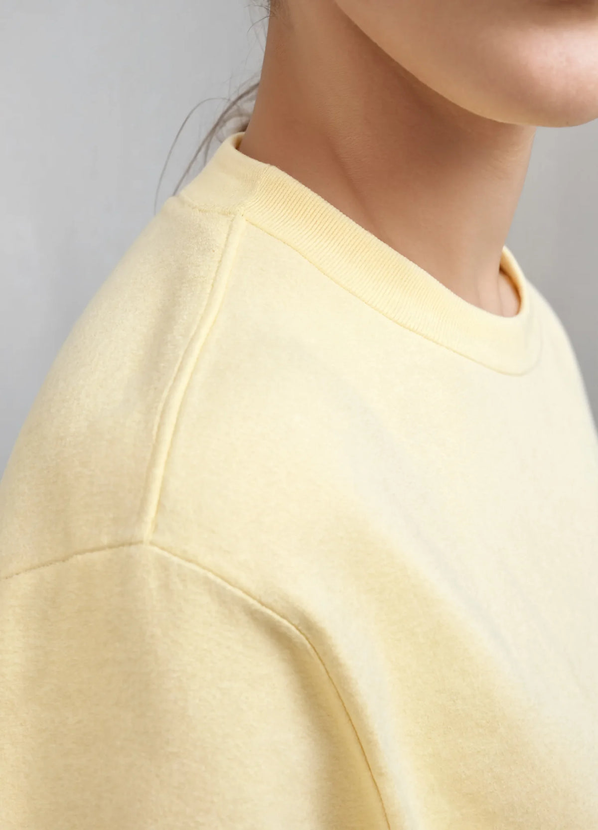 nabi Boxy Tee in Sunday Butter (soft butter yellow), collar and shoulder seam close-up