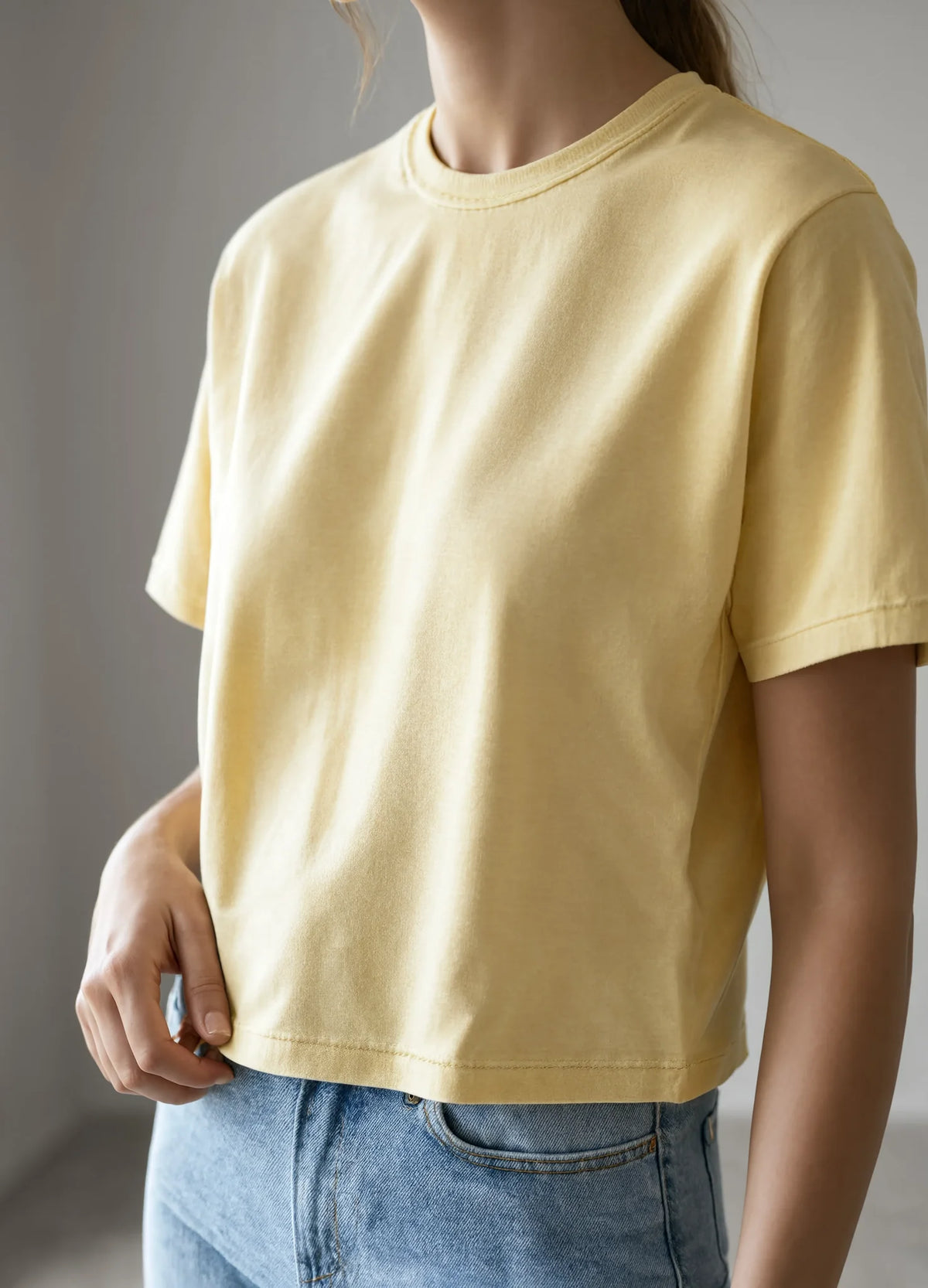 nabi Boxy Tee in Sunday Butter (soft butter yellow), straight hem detail