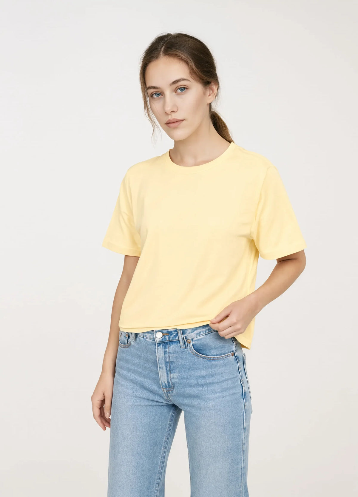 nabi Boxy Tee in Sunday Butter (soft butter yellow), half-body front view