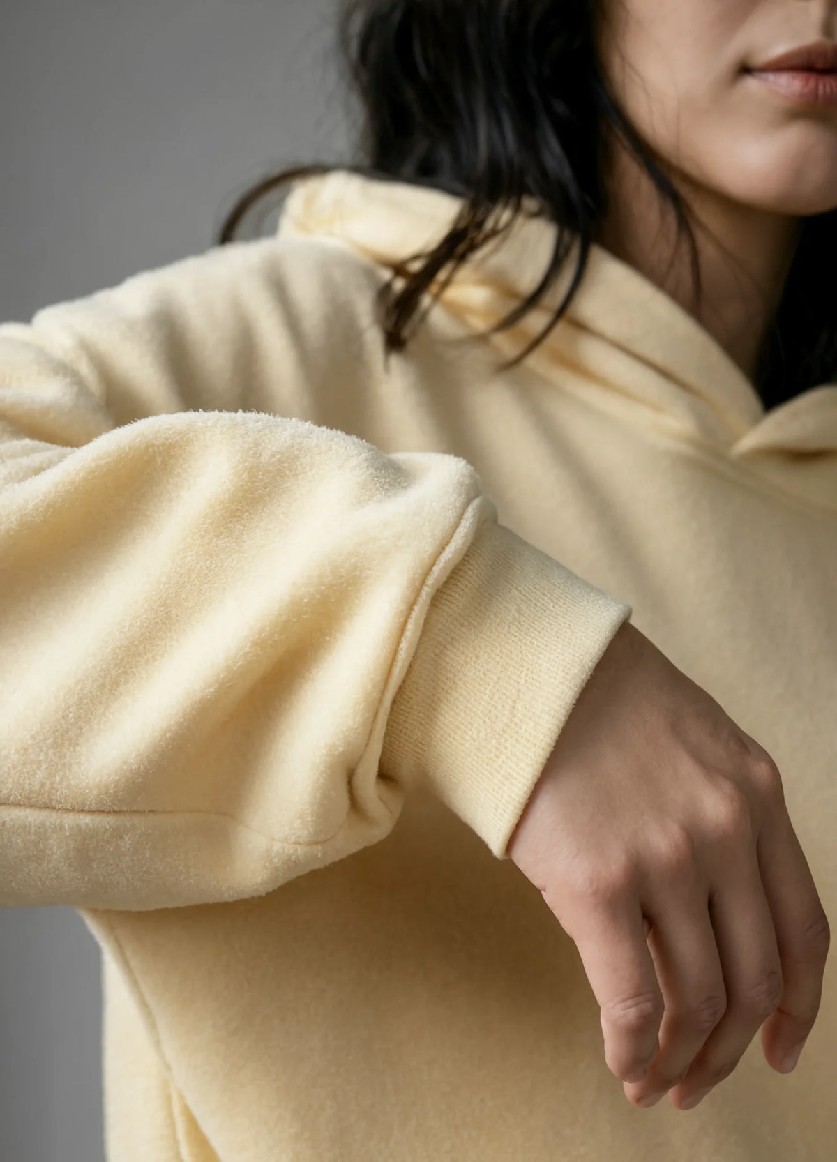 nabi Pullover Hoodie in Sunday Butter (soft butter yellow), ribbed cuff detail