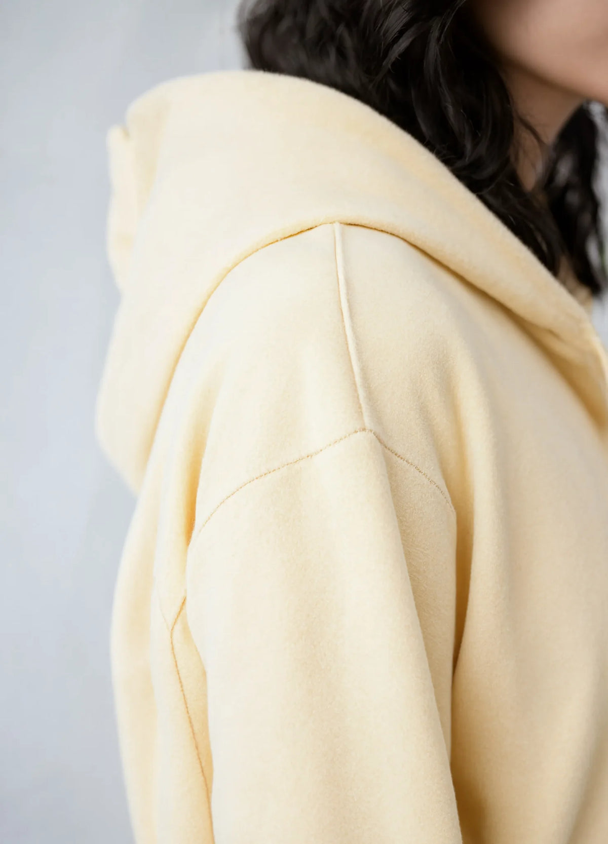 nabi Pullover Hoodie in Sunday Butter (soft butter yellow), drop shoulder seam detail