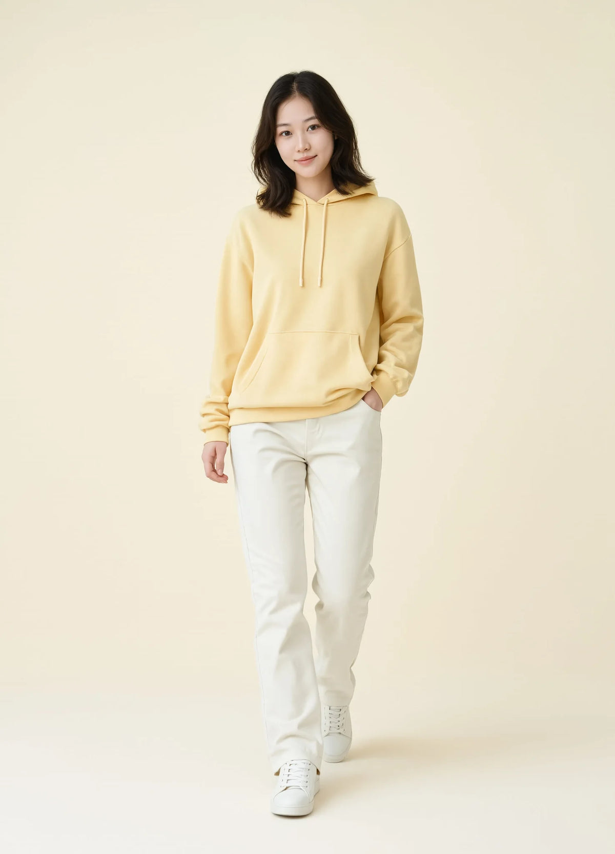 nabi Pullover Hoodie in Sunday Butter (soft butter yellow), front view on model