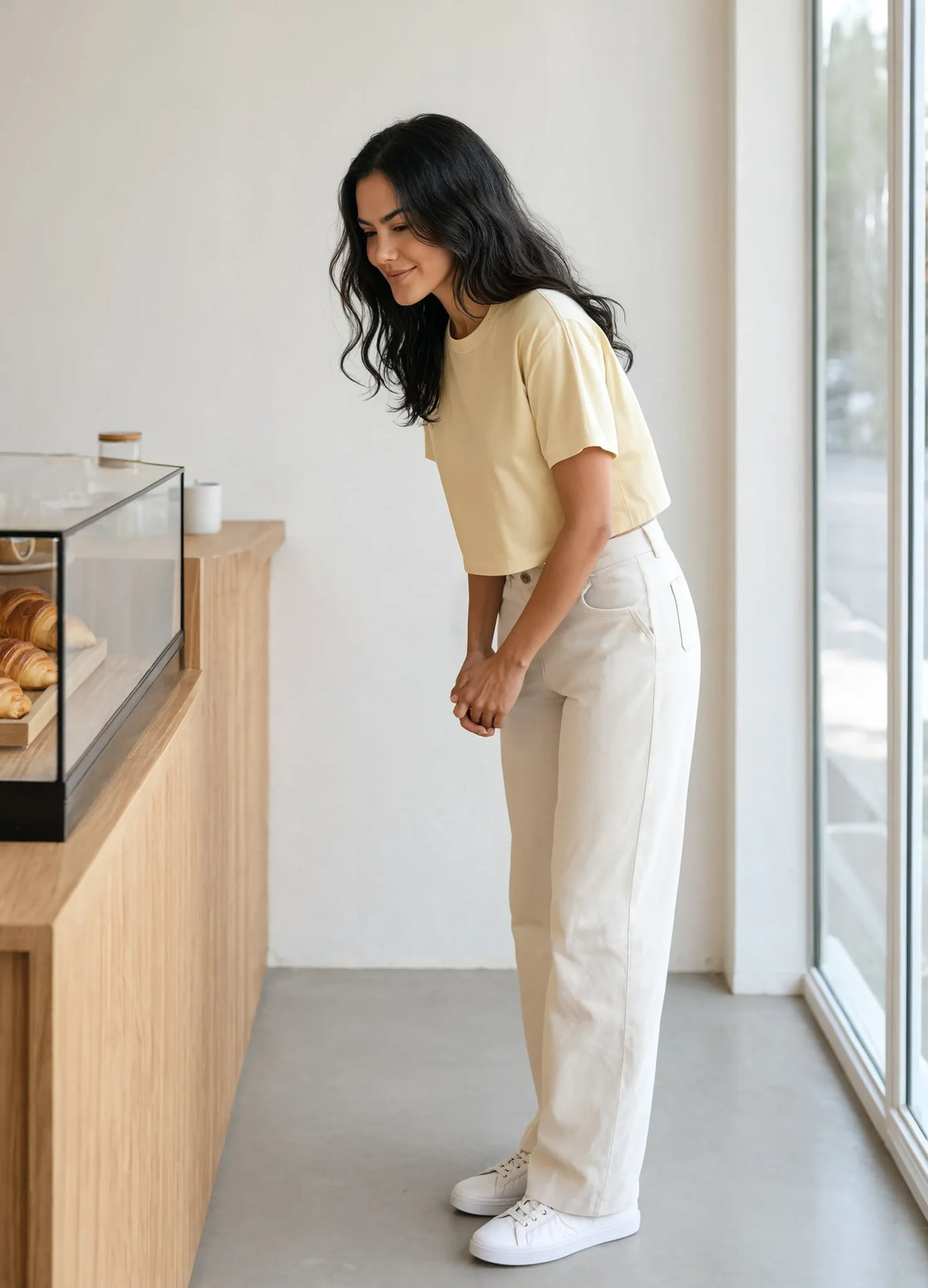 nabi Relaxed Crop Tee in Sunday Butter (soft butter yellow), full length, cafe