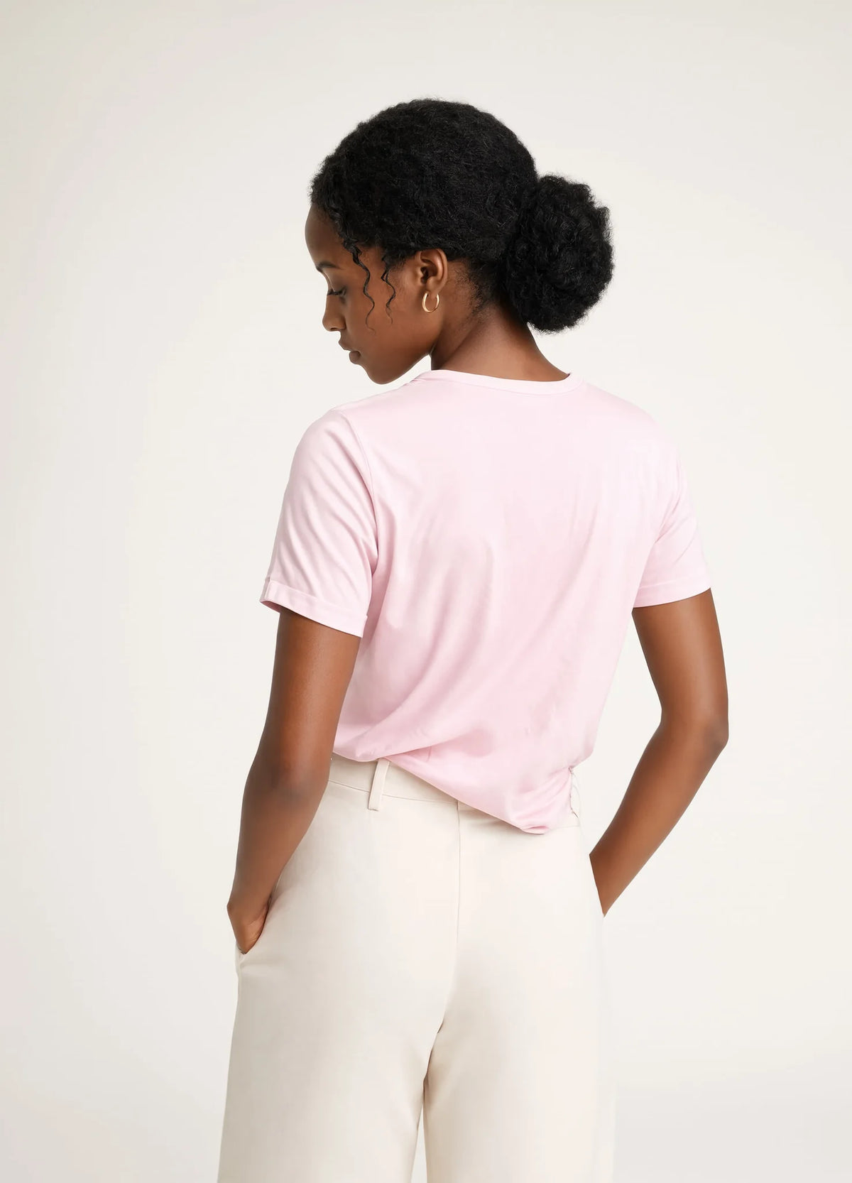 nabi Classic Tee in Underwing (pale pink), back view on model, tucked