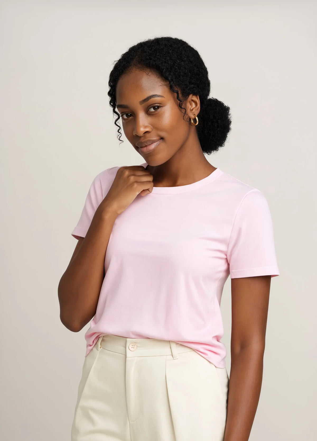 nabi Classic Tee in Underwing (pale pink), waist-up view