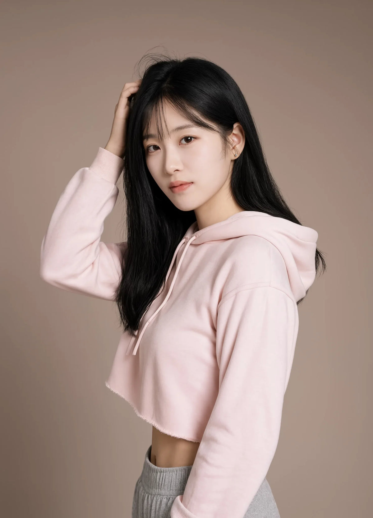 nabi Cropped Hoodie in Underwing (pale pink), mid-turn, in motion