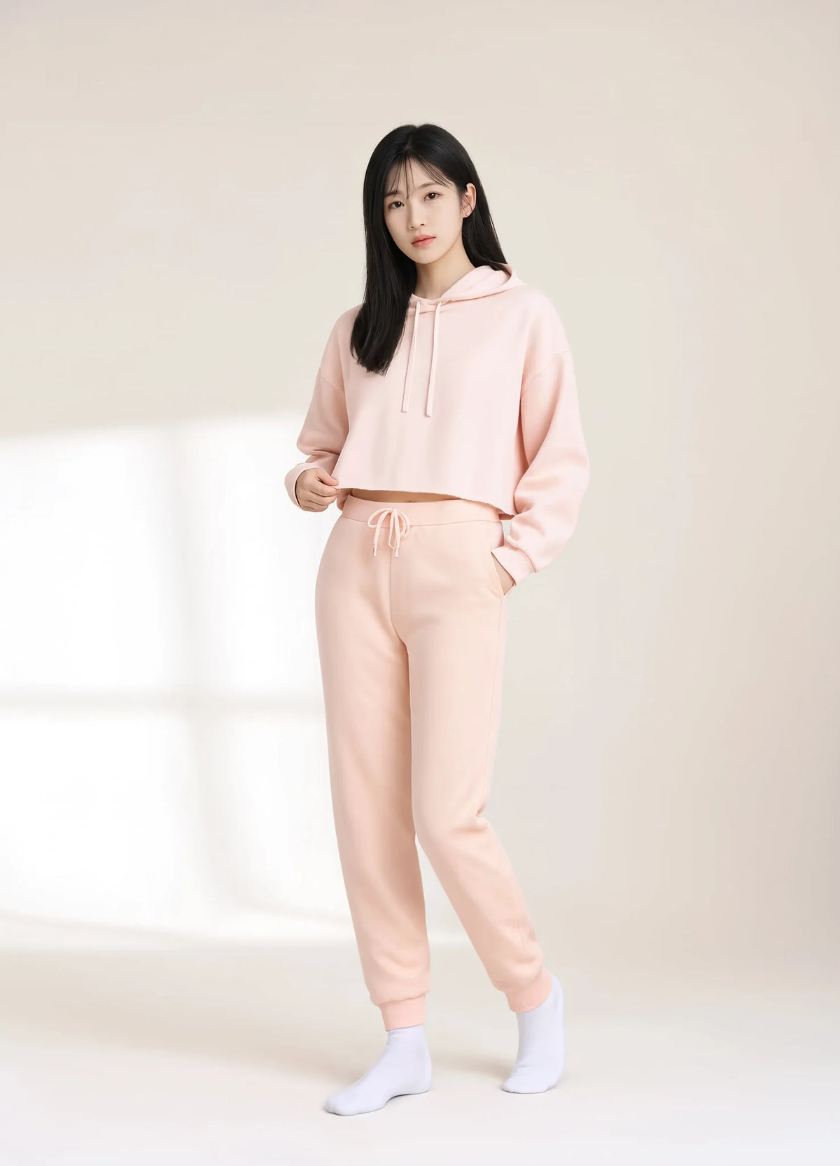 nabi Cropped Hoodie in Underwing (pale pink), worn as a set with the Wash Sweatpants in Peach Faded