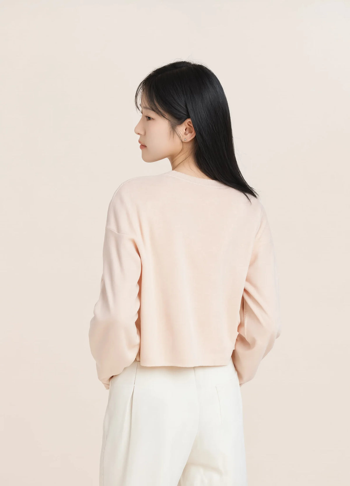 nabi Cropped Crew Sweatshirt in Underwing (pale pink), back view on model