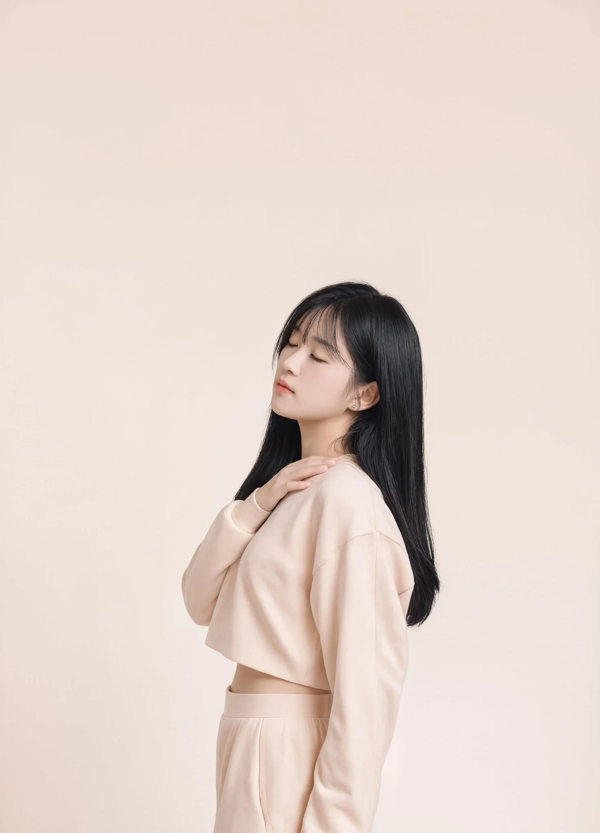 nabi Cropped Crew Sweatshirt in Underwing (pale pink), tonal side view