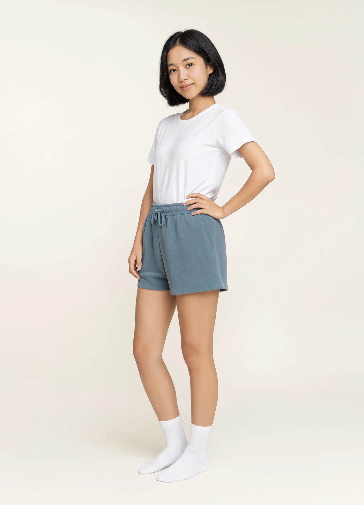 nabi Sweat Shorts in Washed Chambray (washed blue), front view on model