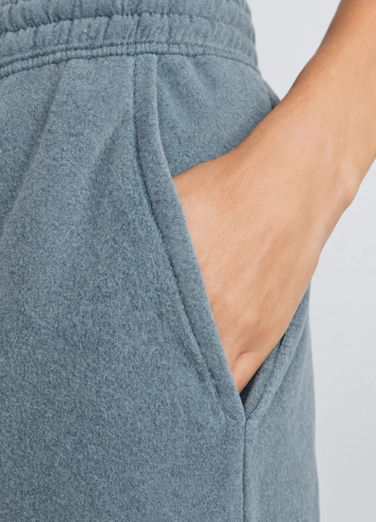 nabi Sweat Shorts in Washed Chambray (washed blue), hand pocket close-up