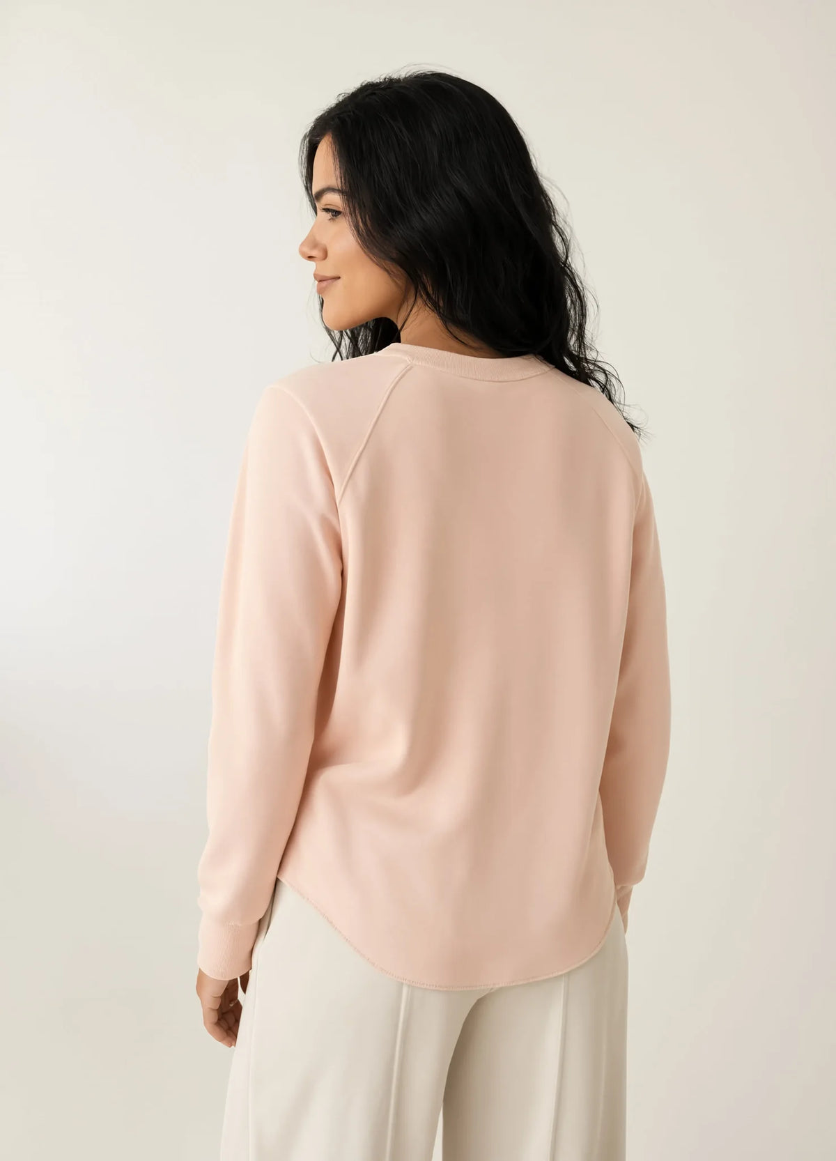 nabi Wash Sweatshirt in Peach Faded (faded peach), back view on model