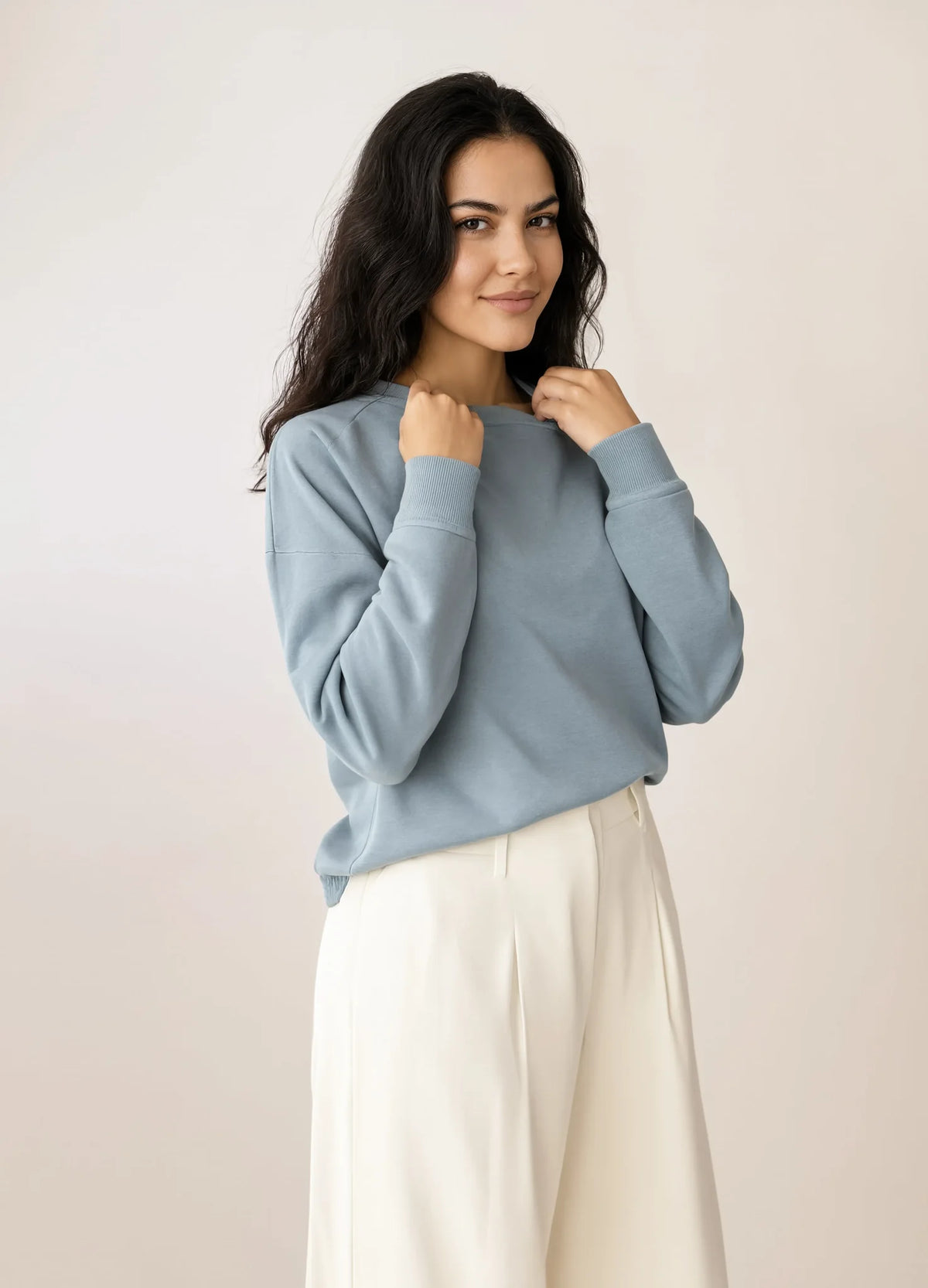 nabi Wash Sweatshirt in Washed Chambray (washed blue), neckline detail on model
