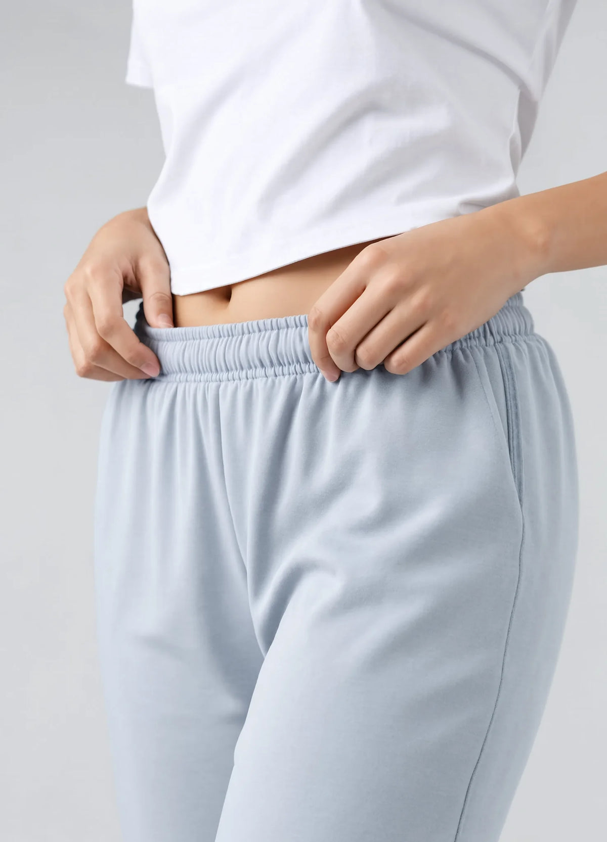 nabi Track Pants in Washed Chambray (washed blue), elastic waistband detail